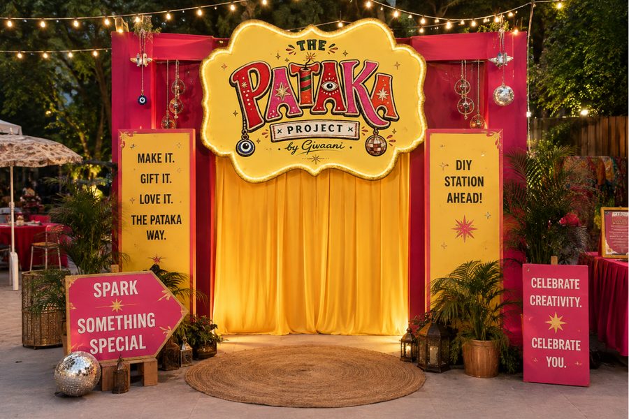 The Pataka Project photo booth with a gold curtain backdrop